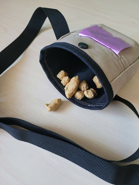 Dog treat pouch and waste bag holder.
