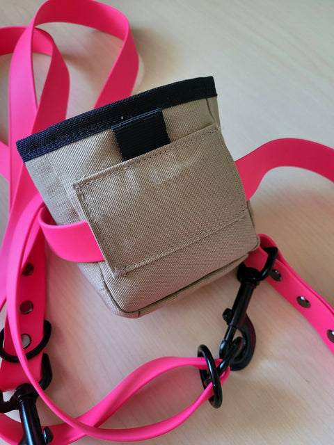 Dog treat pouch and waste bag holder.