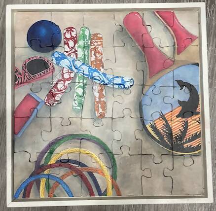 Hand cut, hand painted puzzles